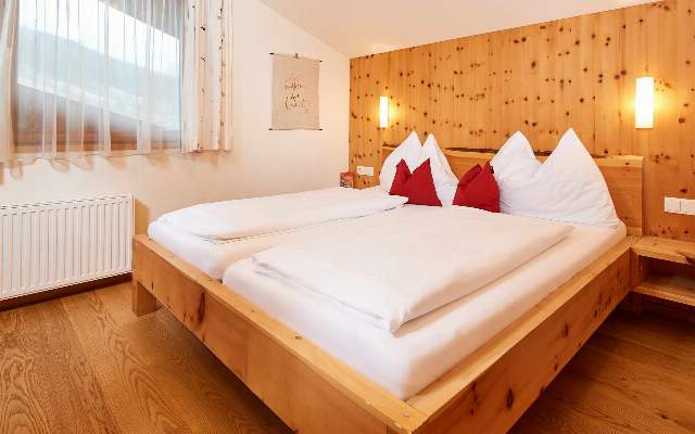 The rooms are furnished with soothing pine wood