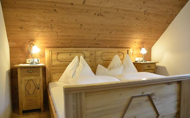 A lot of wood creates a pleasant living climate and promotes a good night's sleep