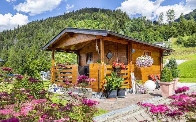 Cosy garden hut with beautiful floral decoration