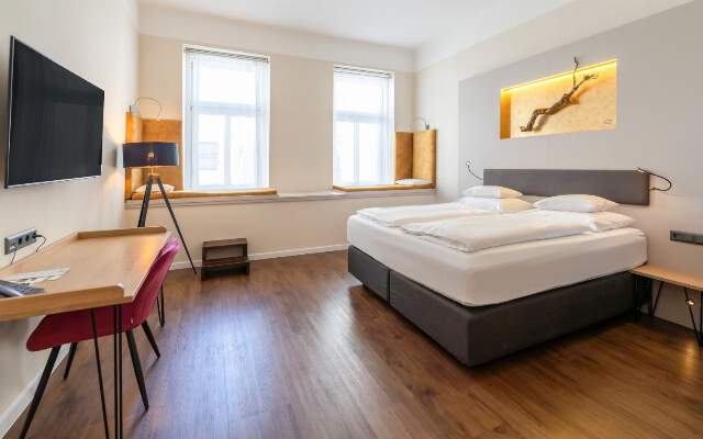 Geräumige Doppel-, Dreibett- und Familienzimmer mit Frühstücksbuffet