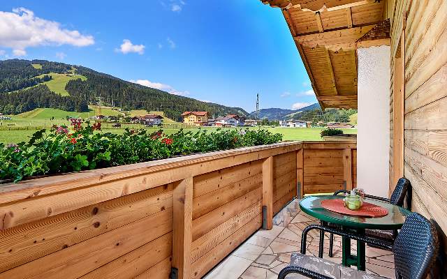 Sunny balcony with a view to the local mountain "Griessenkar"