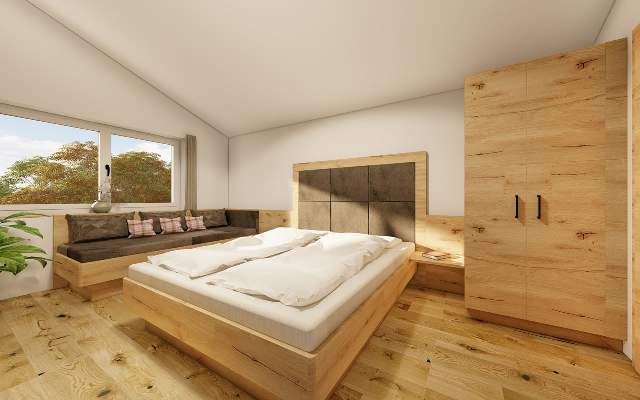 Helles und geräumiges Schlafzimmer mit Doppelbett und Schlafcouch